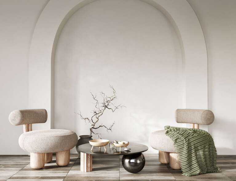 Minimalist interior design with chairs on arch wall background.